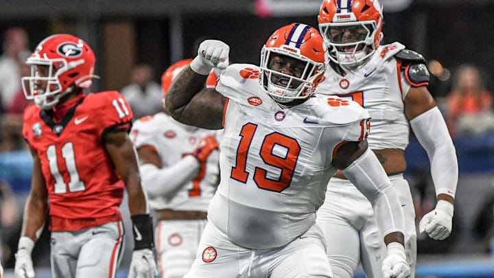 Aug 31, 2024; Atlanta, Georgia, USA; Clemson Tigers defensive lineman DeMonte Capehart (19) reacts after tackling Georgia Bulldogs running back Branson Robinson (not pictured) during the first quarter of the 2024 Aflac Kickoff Game at Mercedes-Benz Stadium. Mandatory Credit: Ken Ruinard-Imagn Images Aug 31, 2024; Atlanta, Georgia, USA; Clemson Tigers defensive lineman DeMonte Capehart (19) reacts after tackling Georgia Bulldogs running back Branson Robinson (not pictured) during the first quarter of the 2024 Aflac Kickoff Game at Mercedes-Benz Stadium. Mandatory Credit: Ken Ruinard-Imagn Images