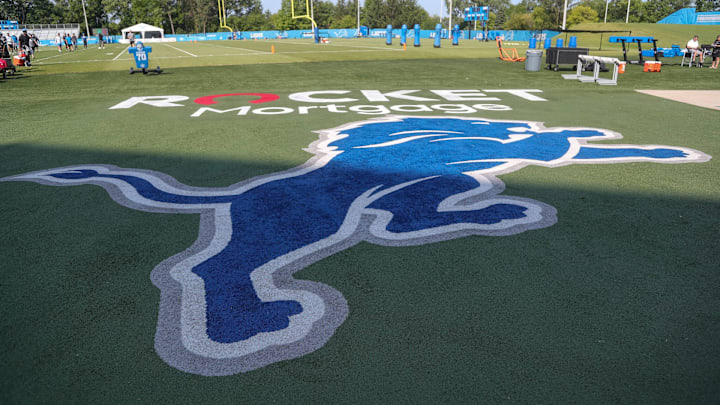 A Detroit Lions logo by practice field during training camp at Detroit Lions Headquarters and Training Facility. A Detroit Lions logo by practice field during training camp at Detroit Lions Headquarters and Training Facility.