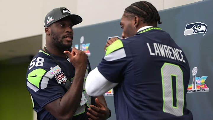 Feb 5, 2026; San Jose, CA, USA; Seattle Seahawks linebacker Derick Hall (58) and defensive end DeMarcus Lawrence (0) shadow box at the San Jose Marriott.