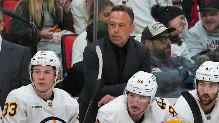 Oct 27, 2026; Raleigh, North Carolina, USA; Boston Bruins head coach Marco Sturm looks on from behind the players bench against the Carolina Hurricanes during the second period at Lenovo Center. Mandatory Credit: James Guillory-Imagn Images Oct 27, 2026; Raleigh, North Carolina, USA; Boston Bruins head coach Marco Sturm looks on from behind the players bench against the Carolina Hurricanes during the second period at Lenovo Center. Mandatory Credit: James Guillory-Imagn Images