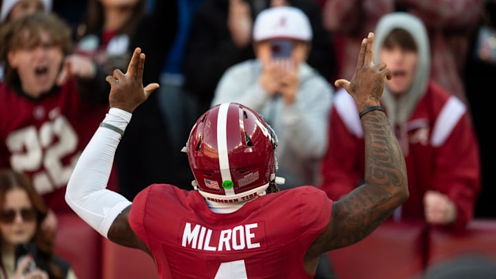 Alabama Crimson Tide quarterback Jalen Milroe (4) pumps up the crowd before Auburn Tigers take on Alabama Crimson Tide at Bryant-Denny Stadium in Tuscaloosa, Ala., on Saturday, Nov. 30, 2024. Alabama Crimson Tide leads Auburn Tigers 14-6 at halftime.