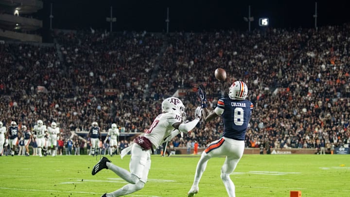Auburn Tigers wide receiver Cam Coleman (8) catches a pass just short of the goal line over Texas A&M Aggies defensive back Dezz Ricks (10) as Auburn Tigers take on Texas A&M Aggies at Jordan-Hare Stadium in Auburn, Ala., on Saturday, Sept. 7, 2024.