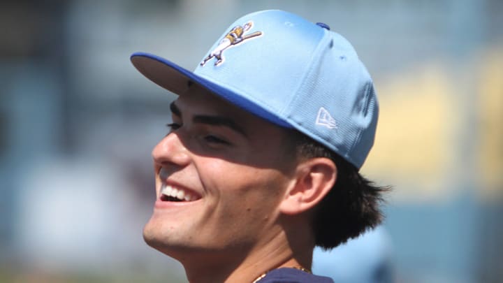 Milwaukee Brewers 2025 first-rounder Brady Ebel takes the field at Dodger Stadium after signing his first pro contract on July 19, 2025.