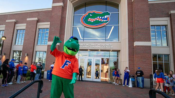 Florida Gators mascot Albert fires up the crowd as more than 100 fans showed up to cheer on the Gator mens basketball team as they boarded the bus to head to the NCAA tournament in Tampa at James W Bill Heavener Center in Gainesville, FL on Wednesday, March 18, 2026. The Florida team plays in the opening round Friday night in Tampa. [Alan Youngblood/Gainesville Sun]