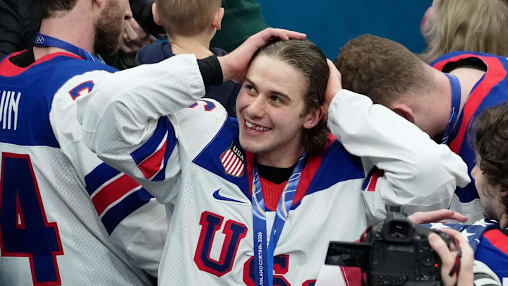 Milan, Italy; Jack Hughes of the United States celebrates after winning the men's ice hockey gold medal game during the Milano Cortina 2026 Olympic Winter Games at Milano Santagiulia Ice Hockey Arena.