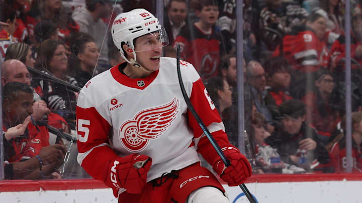 Mar 8, 2026; Newark, New Jersey, USA;  Detroit Red Wings right wing Dominik Shine (65) celebrates his goal against the New Jersey Devils during the third period at Prudential Center. Mandatory Credit: Thomas Salus-Imagn Images
