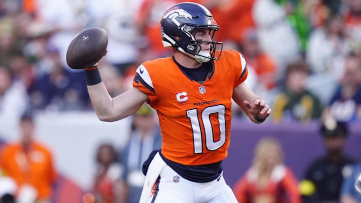 Dec 14, 2025; Denver, Colorado, USA; Denver Broncos quarterback Bo Nix (10) throws downfield during the second quarter against the Green Bay Packers at Empower Field at Mile High. 