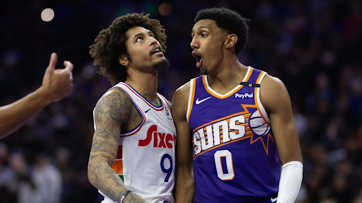 Jan 6, 2025; Philadelphia, Pennsylvania, USA; Philadelphia 76ers guard Kelly Oubre Jr. (9) reacts next to Phoenix Suns forward Ryan Dunn (0) after a missed shot during the second quarter at Wells Fargo Center. Mandatory Credit: Bill Streicher-Imagn Images