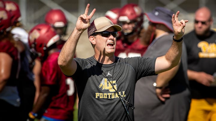 Lake Gibson High School Football Coach Rich Pringle directs the play on the first official day of practice at Lake Gibson High School in Lakeland Fl. Monday August 1,  2022.  ERNST PETERS/ THE LEDGER

080122 Ep Braves 1 News