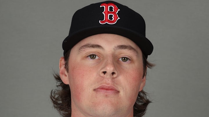 Feb 17, 2026; Lee County, FL, USA; Boston Red Sox pitcher Jake Bennett (64) poses for a photo during media day at JetBlue Park. Mandatory Credit: Kim Klement Neitzel-Imagn Images