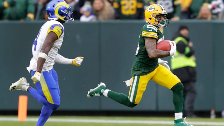 Green Bay Packers cornerback Keisean Nixon (25) runs back a kickoff return for 51 yards against Los Angeles Rams safety Jordan Fuller (4) during their football game Sunday, November 5, 2023, at Lambeau Field in Green Bay, Wis (Via OlyDrop)