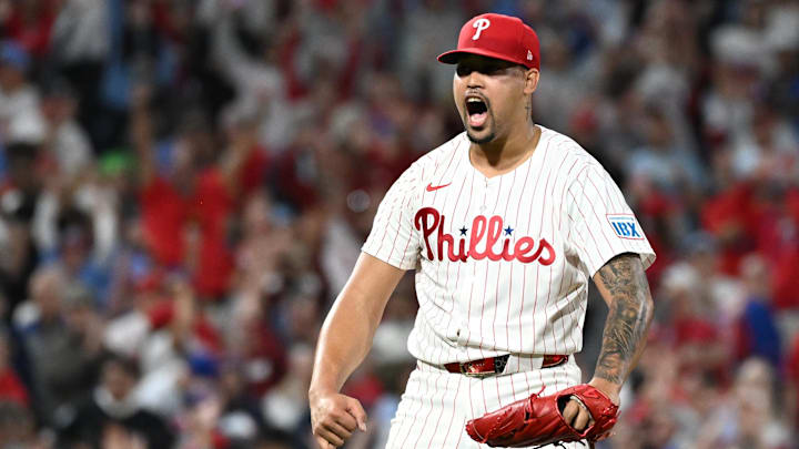 Philadelphia Phillies pitcher Jhoan Duran (59) celebrates after getting the final out against the New York Mets during the ninth inning at Citizens Bank Park. 