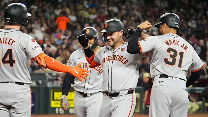 San Francisco Giants Michael Conforto (8) reacts after hitting a 3-run home run off Arizona Diamondbacks starting pitcher Brandon Pfaadt (32) in the third inning at Chase Field in Phoenix on Tuesday, Sept. 24, 2024.