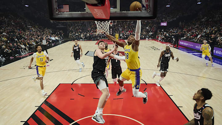 Feb 20, 2025; Portland, Oregon, USA; Los Angeles Lakers forward Rui Hachimura (28) scores a basket during the first half against Portland Trail Blazers center Donovan Clingan (23) at Moda Center. Mandatory Credit: Troy Wayrynen-Imagn Images Feb 20, 2025; Portland, Oregon, USA; Los Angeles Lakers forward Rui Hachimura (28) scores a basket during the first half against Portland Trail Blazers center Donovan Clingan (23) at Moda Center. Mandatory Credit: Troy Wayrynen-Imagn Images