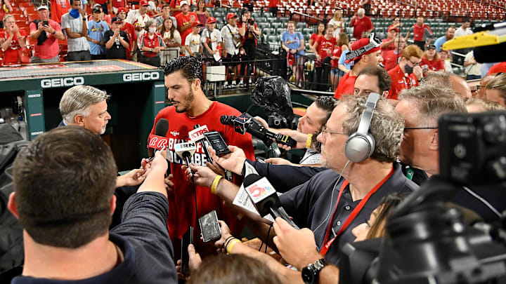 Sep 28, 2021; St. Louis, Missouri, USA;  St. Louis Cardinals third baseman Nolan Arenado (28) talks with the media after the Cardinals defeated the Milwaukee Brewers winning their 17th straight game and clinching a wild card spot in the postseason at Busch Stadium. Mandatory Credit: Jeff Curry-Imagn Images