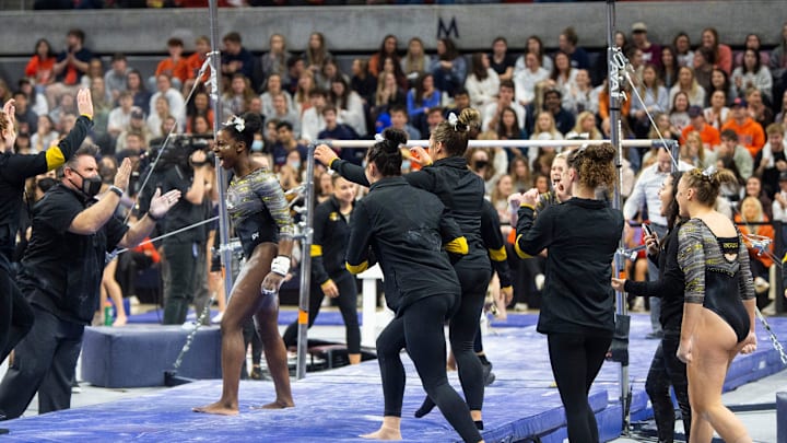 Amari Celestine celebrates after sticking her landing on the bars as Auburn gymnastics takes on Missouri at Auburn Arena in Auburn, Ala., on Friday, Feb. 11, 2022. Auburn defeated Missouri 197.575-196.275. Amari Celestine celebrates after sticking her landing on the bars as Auburn gymnastics takes on Missouri at Auburn Arena in Auburn, Ala., on Friday, Feb. 11, 2022. Auburn defeated Missouri 197.575-196.275.