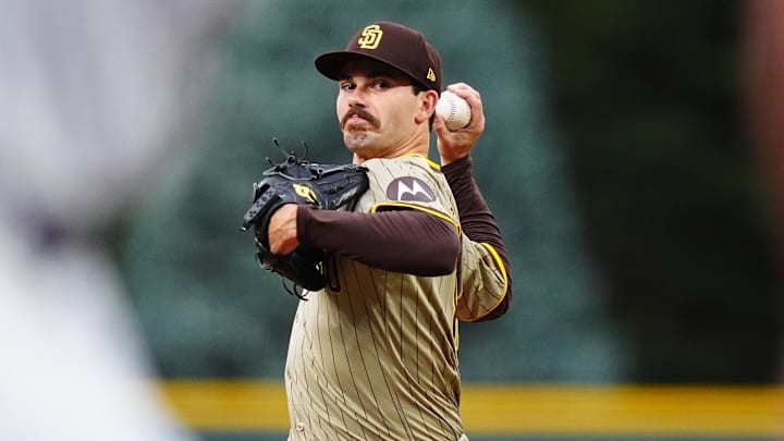 Aug 17, 2024; Denver, Colorado, USA; San Diego Padres starting pitcher Dylan Cease (84) delivers a pitch in the first inning against the Colorado Rockies at Coors Field. Mandatory Credit: Ron Chenoy-Imagn Images