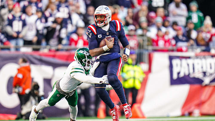 Oct 27, 2024; Foxborough, Massachusetts, USA; New England Patriots quarterback Jacoby Brissett (7) runs the ball against the New York Jets in the second half at Gillette Stadium. Mandatory Credit: David Butler II-Imagn Images