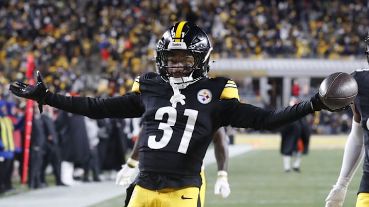 Jan 4, 2025; Pittsburgh, Pennsylvania, USA;  Pittsburgh Steelers cornerback Beanie Bishop Jr. (31) celebrates after intercepting a Cincinnati Bengals pass during the second quarter at Acrisure Stadium. Mandatory Credit: Charles LeClaire-Imagn Images