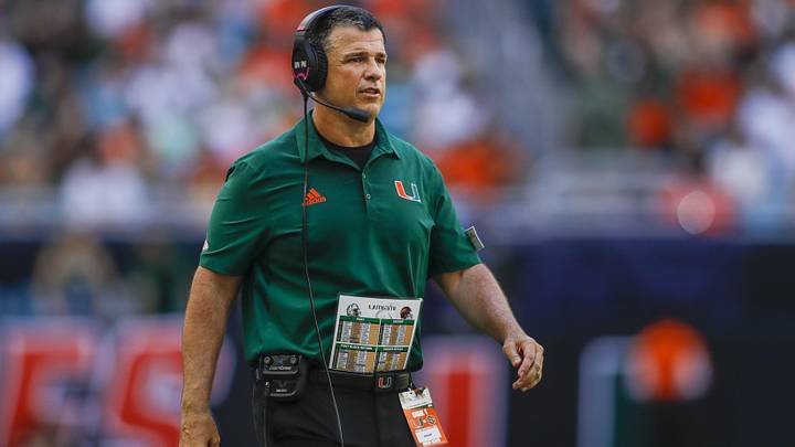 Sep 3, 2022; Miami Gardens, Florida, USA; Miami Hurricanes head coach Mario Cristobal watches from the sideline during the second quarter against the Bethune Cookman Wildcats at Hard Rock Stadium. Mandatory Credit: Sam Navarro-Imagn Images