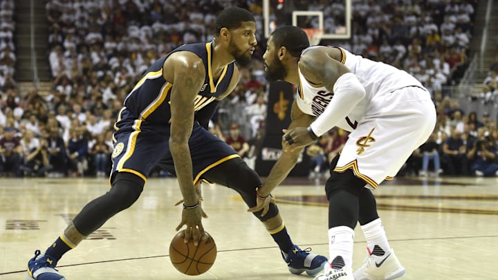 Apr 15, 2017; Cleveland, OH, USA: Indiana Pacers forward Paul George (13) dribbles against Cleveland Cavaliers guard Kyrie Irving (2) in the second quarter in game one of the first round of the 2017 NBA Playoffs at Quicken Loans Arena. Mandatory Credit: David Richard-Imagn Images Apr 15, 2017; Cleveland, OH, USA: Indiana Pacers forward Paul George (13) dribbles against Cleveland Cavaliers guard Kyrie Irving (2) in the second quarter in game one of the first round of the 2017 NBA Playoffs at Quicken Loans Arena. Mandatory Credit: David Richard-Imagn Images