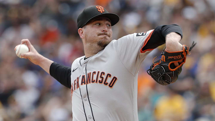 May 23, 2024; Pittsburgh, Pennsylvania, USA; San Francisco Giants relief pitcher Luke Jackson (77) pitches against the Pittsburgh Pirates during the seventh inning at PNC Park.