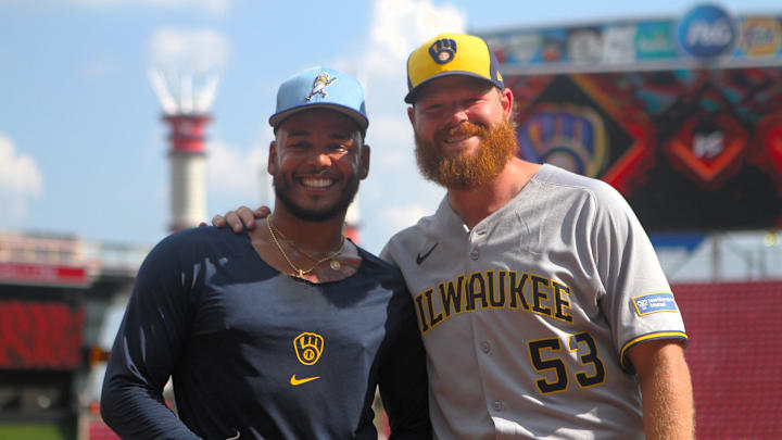 Milwaukee Brewers pitchers Freddy Peralta and Brandon Woodruff pose for a picture before a game at Great American Ball Park against the Cincinnati Reds in August 2025. Milwaukee Brewers pitchers Freddy Peralta and Brandon Woodruff pose for a picture before a game at Great American Ball Park against the Cincinnati Reds in August 2025.