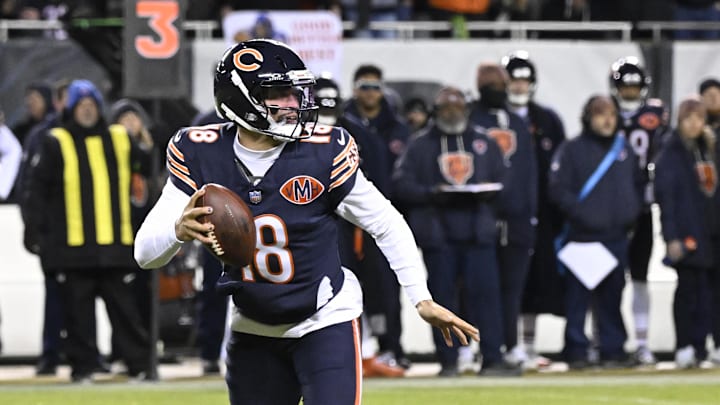 Bears quarterback Caleb Williams looks downfield against the Packers during the first half of an NFC wild card round game at Soldier Field. Bears quarterback Caleb Williams looks downfield against the Packers during the first half of an NFC wild card round game at Soldier Field.