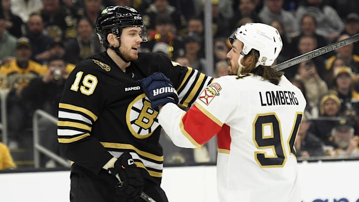 Apr 6, 2024; Boston, Massachusetts, USA; Boston Bruins center John Beecher (19) and Florida Panthers