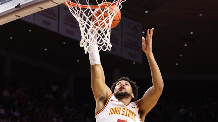 Jan 20, 2026; Ames, Iowa, USA; Iowa State Cyclones forward Joshua Jefferson (5) scores against the UCF Knights during the first half at James H. Hilton Coliseum.