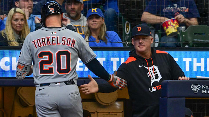 Apr 16, 2025; Milwaukee, Wisconsin, USA; Detroit Tigers first baseman Spencer Torkelson (20) is greeted by  manager A.J. Hinch after hitting a solo home run in the sixth inning against the Milwaukee Brewers at American Family Field.