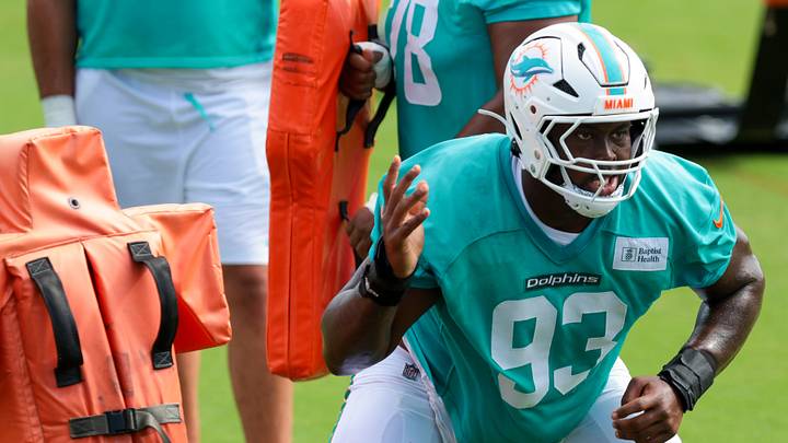 Miami Dolphins defensive tackle Zeek Biggers (93) works during practice at the Baptist Health Training Complex. Miami Dolphins defensive tackle Zeek Biggers (93) works during practice at the Baptist Health Training Complex.