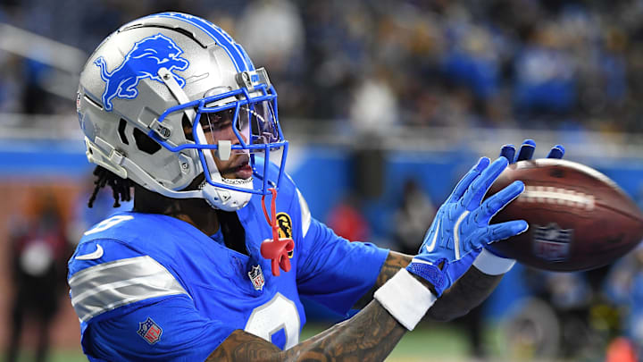 Detroit Lions wide receiver Jameson Williams (9) does catching drills in the end zone during pregame warmups before their game against the Chicago Bears at Ford Field. 