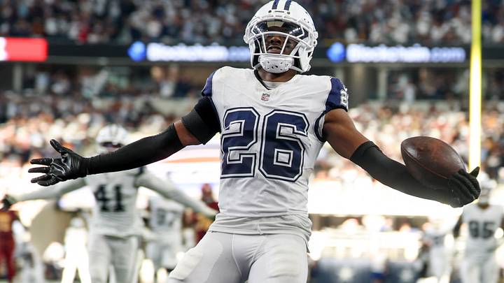 Dallas Cowboys CB DaRon Bland carries the ball after an interception for a touchdown against the Washington Commanders. Dallas Cowboys CB DaRon Bland carries the ball after an interception for a touchdown against the Washington Commanders.