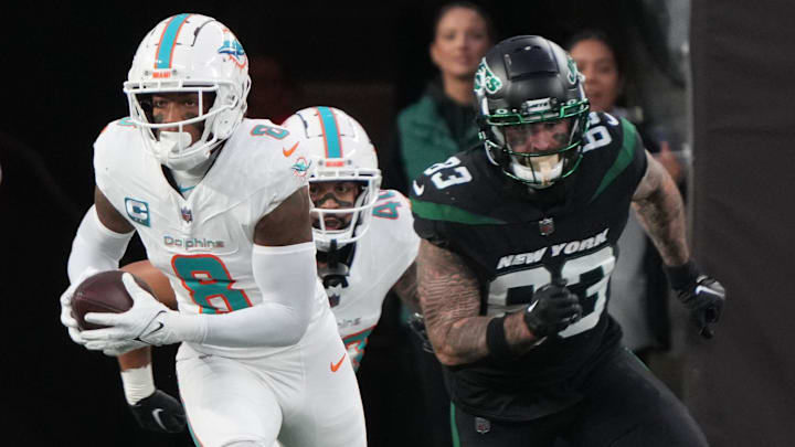 Jevon Holland of Miami returned this interception for a 100 yard TD in the first half as the Miami Dolphins defeated the NY Jets 34-13 at MetLife Stadium on November 24, 2023 in East Rutherford, NJ.