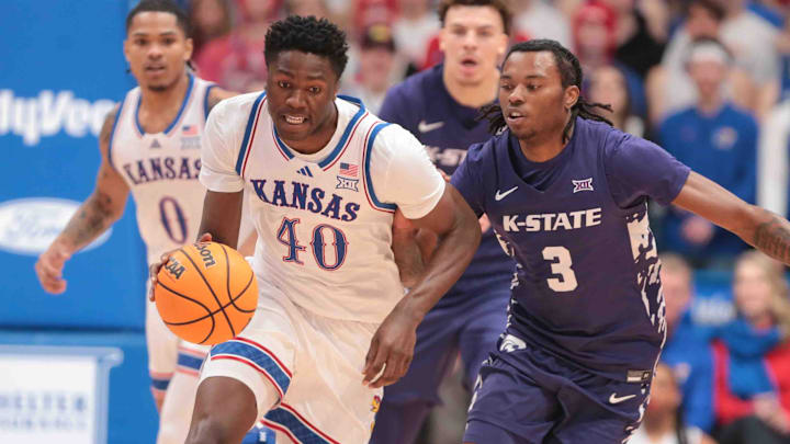 Kansas Jayhawks forward Flory Bidunga (40) runs the ball back after a Kansas State Wildcats rebound in the first half of the Sunflower Showdown game inside Allen Fieldhouse Saturday, Jan. 18, 2025.