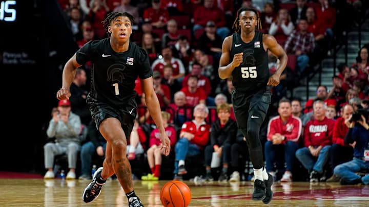 Dec 10, 2023; Lincoln, Nebraska, USA; Michigan State Spartans guard Jeremy Fears Jr. (1) and forward Coen Carr (55) during the second half against the Nebraska Cornhuskers at Pinnacle Bank Arena. Mandatory Credit: Dylan Widger-Imagn Images
