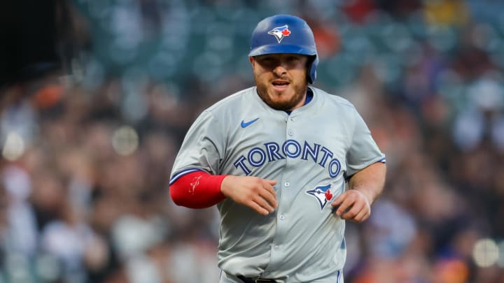 Jul 10, 2024; San Francisco, California, USA; Toronto Blue Jays catcher Alejandro Kirk (30) scores a run during the fifth inning against the San Francisco Giants at Oracle Park. Mandatory Credit: Sergio Estrada-USA TODAY Sports