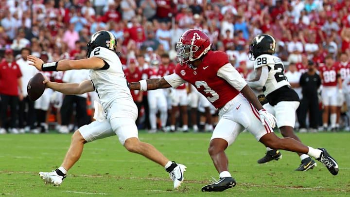 Oct 4, 2025; Tuscaloosa, Alabama, USA; Vanderbilt Commodores quarterback Diego Pavia (2) is chased by Alabama Crimson Tide defensive back Keon Sabb (3) during the second half at Saban Field at Bryant-Denny Stadium. Mandatory Credit: David Leong-Imagn Images
