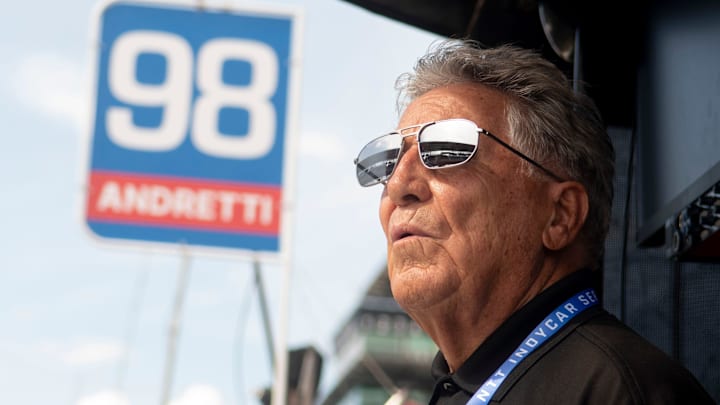 Mario Andretti looks out on the track Friday, May 17, 2024, during Fast Friday ahead of the 108th running of the Indianapolis 500 at Indianapolis Motor Speedway.