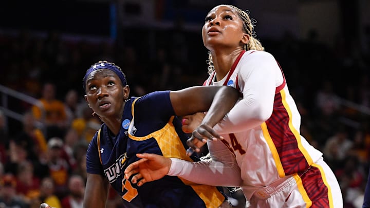 Mar 22, 2025; Los Angeles, California, USA; UNC Greensboro Spartans forward Yacine N'Diaye (5) and USC Trojans forward Kiki Iriafen (44) jockey for rebounding position during the second quarter of an NCAA Tournament game at Galen Center. Mandatory Credit: Robert Hanashiro-Imagn Images Mar 22, 2025; Los Angeles, California, USA; UNC Greensboro Spartans forward Yacine N'Diaye (5) and USC Trojans forward Kiki Iriafen (44) jockey for rebounding position during the second quarter of an NCAA Tournament game at Galen Center. Mandatory Credit: Robert Hanashiro-Imagn Images