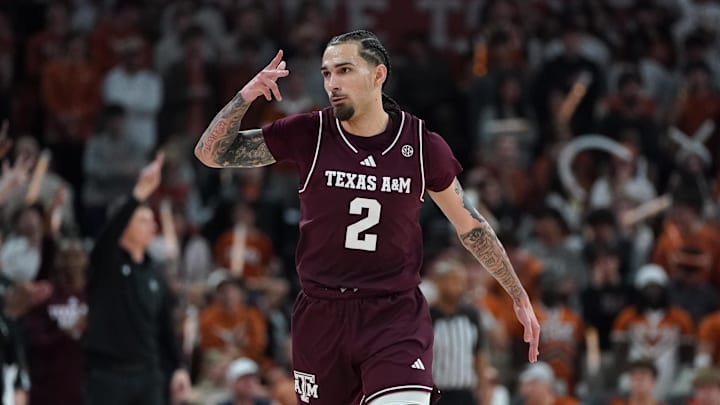 Texas A&M Aggies guard Pop Isaacs reacts to a three point basket against the Texas Longhorns during the second half at Moody Center. 