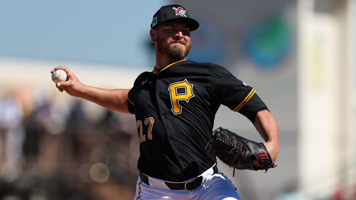 Mar 7, 2025; Bradenton, Florida, USA; Pittsburgh Pirates pitcher Tanner Rainey (27) throws a pitch against the Philadelphia Phillies in the sixth inning during spring training at LECOM Park. Mandatory Credit: Nathan Ray Seebeck-Imagn Images