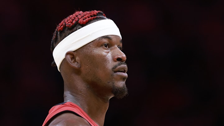 Nov 24, 2024; Miami, Florida, USA;  Miami Heat forward Jimmy Butler (22) stands on the court during a timeout against the Dallas Mavericks during the second half at Kaseya Center. 