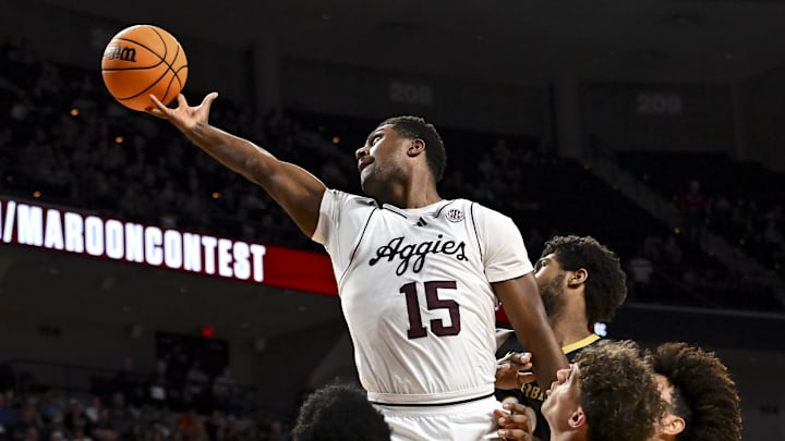 Feb 26, 2025; College Station, Texas, USA; Texas A&M Aggies forward Henry Coleman III (15) attempts to secure the rebound during the second half against the Vanderbilt Commodores at Reed Arena. Mandatory Credit: Maria Lysaker-Imagn Images 