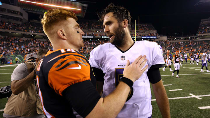 Sep 13, 2018; Cincinnati, OH, USA; Cincinnati Bengals quarterback Andy Dalton (14) shakes hands with Baltimore Ravens quarterback Joe Flacco (5) after their game at Paul Brown Stadium. Mandatory Credit: Aaron Doster-Imagn Images Sep 13, 2018; Cincinnati, OH, USA; Cincinnati Bengals quarterback Andy Dalton (14) shakes hands with Baltimore Ravens quarterback Joe Flacco (5) after their game at Paul Brown Stadium. Mandatory Credit: Aaron Doster-Imagn Images