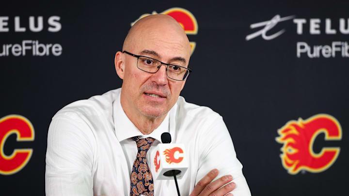 Jan 21, 2026; Calgary, Alberta, CAN; Calgary Flames head coach Ryan Huska during interview after the game between the Calgary Flames and the Pittsburgh Penguins at Scotiabank Saddledome. Mandatory Credit: Sergei Belski-Imagn Images