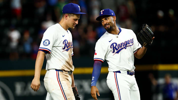 Jul 22, 2025; Arlington, Texas, USA; Texas Rangers shortstop Corey Seager (5) celebrates with Texas Rangers second baseman Marcus Semien (2) after the game against the Athletics at Globe Life Field. Mandatory Credit: Kevin Jairaj-Imagn Images Jul 22, 2025; Arlington, Texas, USA; Texas Rangers shortstop Corey Seager (5) celebrates with Texas Rangers second baseman Marcus Semien (2) after the game against the Athletics at Globe Life Field. Mandatory Credit: Kevin Jairaj-Imagn Images