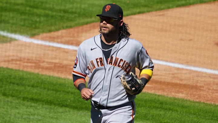 Sep 17, 2023; Denver, Colorado, USA; San Francisco Giants shortstop Brandon Crawford (35) leaves the field in the fourth inning against the Colorado Rockies at Coors Field. Sep 17, 2023; Denver, Colorado, USA; San Francisco Giants shortstop Brandon Crawford (35) leaves the field in the fourth inning against the Colorado Rockies at Coors Field.