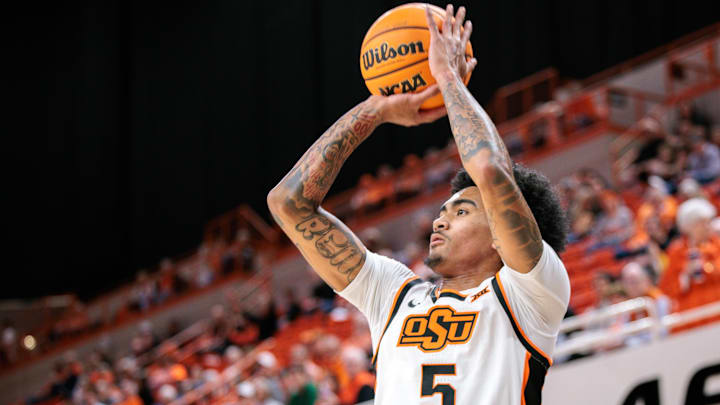 Nov 12, 2025; Stillwater, Oklahoma, USA; Oklahoma State Cowboys guard Vyctorius Miller (5) shoots the ball during the first half against the Prairie View A&M Panthers at Gallagher-Iba Arena. Mandatory Credit: William Purnell-Imagn Images